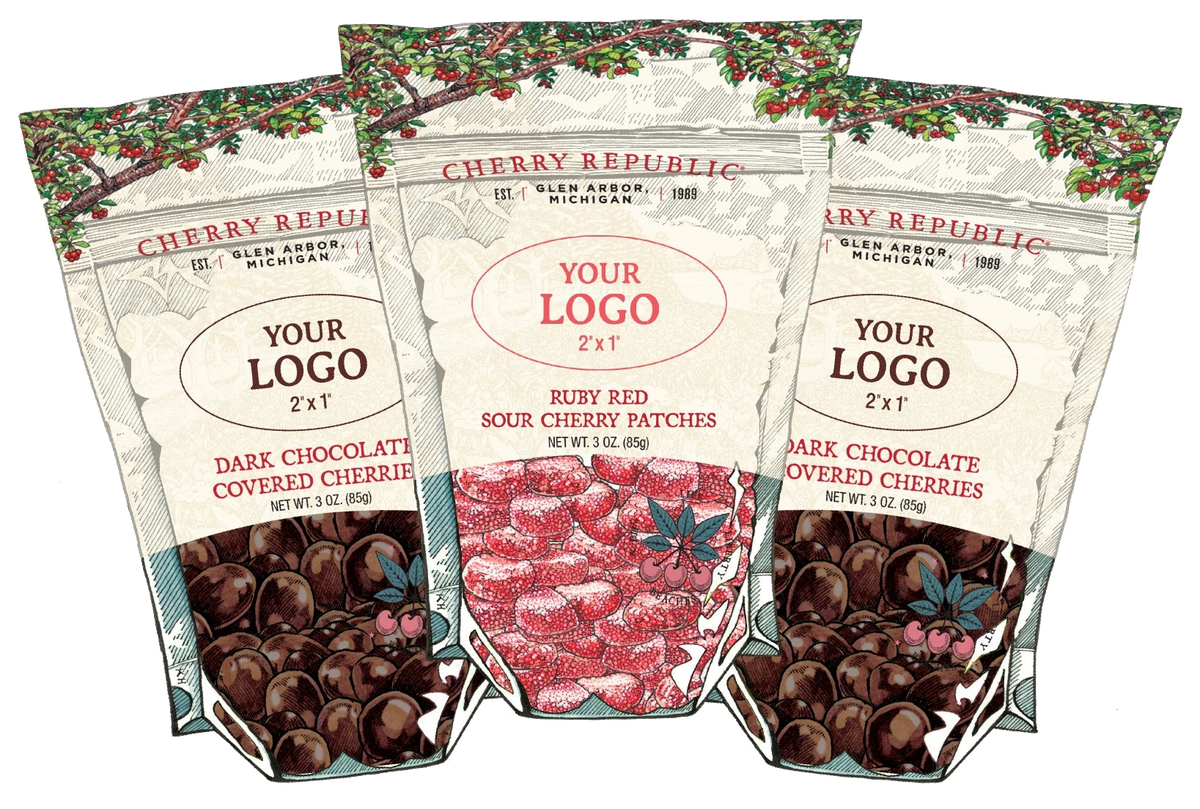 Three Cherry Republic 3 oz pouches, each with a blank 2 by 1 inch oval for your logo: Dark Chocolate Covered Cherries and Ruby Red Sour Cherry Patches