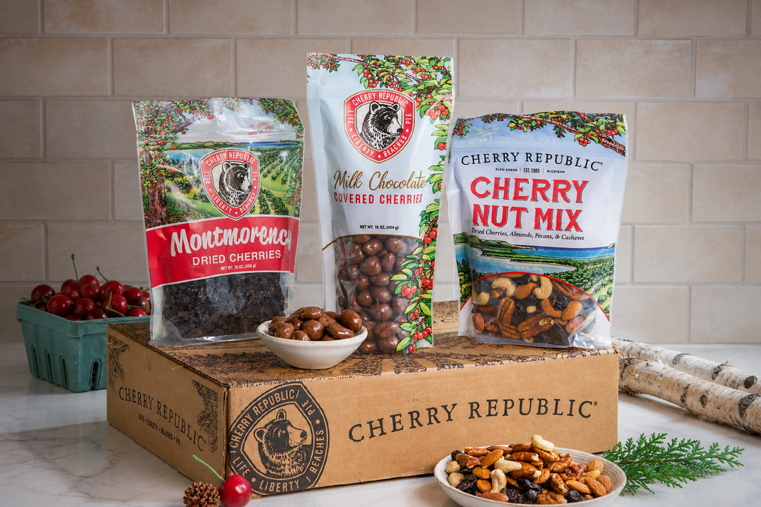 Cherry Republic’s Montmorency Dried Cherries, Milk Chocolate Covered Cherries, and Cherry Nut Mix displayed on a branded box.