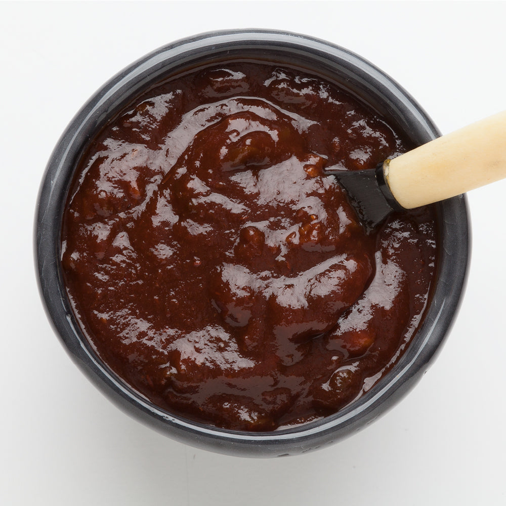 A bowl of rich barbecue sauce