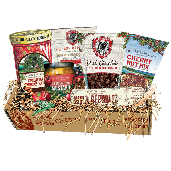 Cherry Republic gourmet gift basket featuring original cherry salsa, cherry artisan mustard, cherry nut mix, dark chocolate covered cherries, milk chocolate cherry malt balls, and premium cherry summer sausage.