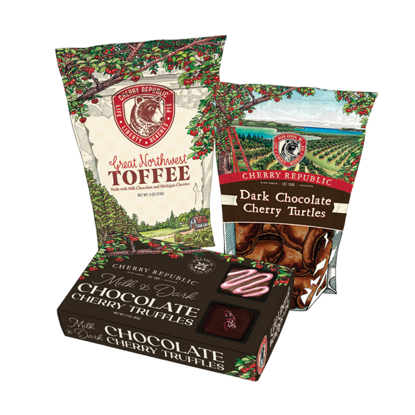 Cherry Republic chocolate gift assortment featuring Great Northwest Toffee, Dark Chocolate Cherry Turtles, and milk and dark chocolate cherry truffles.